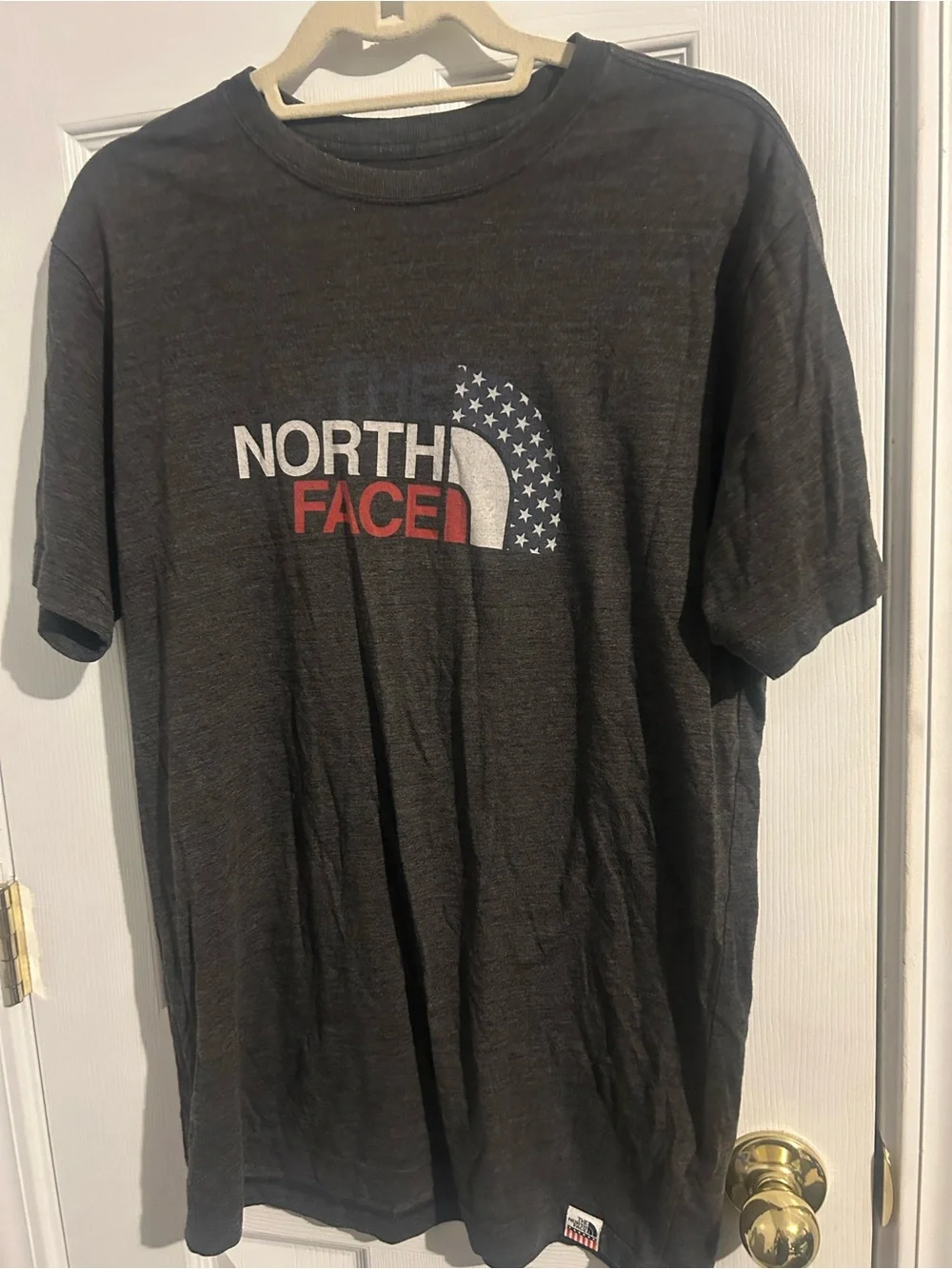 The North Face Men's Black Short Sleeve Logo Tee with Red & White Accents